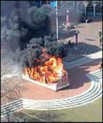 The Forward statue on fire