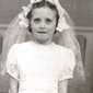 Anne's First Holy Communion day, May 1953. Anne's mum brought her to Sloan's photography shop on Oldtown Street, Cookstown, to have this picture taken