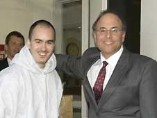 TJ (Thaddeus Jimenez) and lawyer Steven Drizin. Loren Santow/AFP/Getty Images