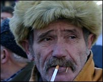 Protester with cigarette and toothpick (picture by Maarten Lernout)