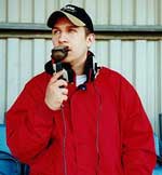 Paul behind the microphone.