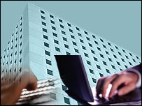 Ilustração de prédio e computador