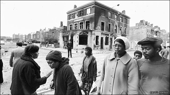 Burnt out buildings in Brixton, April 1981