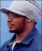 Ty: Rap artist in side profile