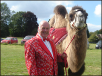 Circus director Martin Lacey and one of the camels