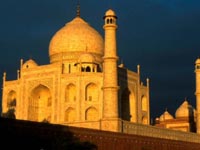 Corner of the Taj Mahal palace in golden sunlight