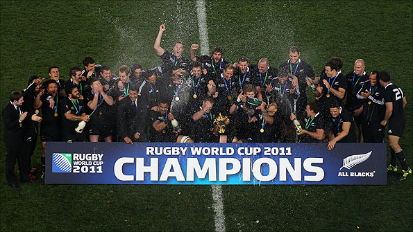 New Zealand players celebrate after beating France to win the Rugby World Cup
