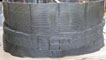 Photograph of the torso, and belt detail, of the Six Bells Miners' Memorial