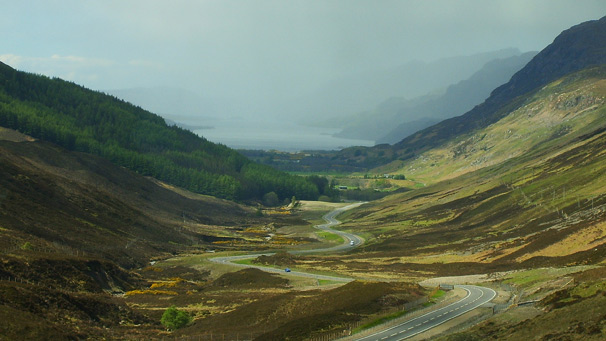 Main road winds its way down a glen