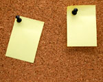 Post-it notes on a memo board