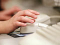 Photo of a student using a mouse