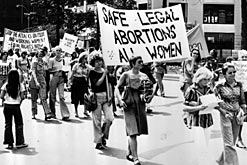 Women take part in a rally promoting their right to abortion
