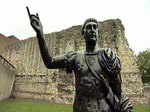 Roman Wall and statue of Trajan