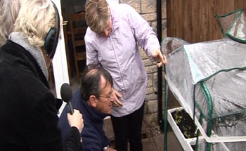 John take a close look at the greenhouse