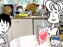 Alice and Helen and the cat in the kitchen