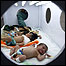 A doctor attends to infants at the neonatal intensive care unit of the Shri Maharaja Gulab Singh Memorial (SMGS) Hospital in Jammu, India, Wednesday, July 11, 2007