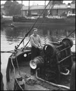 Stewart Pearson at the winch on the puffer 'Celt'. Photo courtesy of Calum Pearson