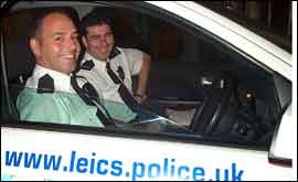 police officers in patrol car