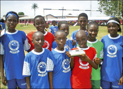 Nigeria: Young competitors take a break from their annual sports event at the Omolaja Shodipo Memorial School to catch up with news on the radio. From Adebari Eniola, Ogun State