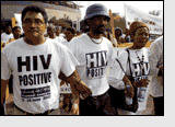 AIDS activist Zackie Achmat, left, during a protest march in Durban, South Africa 