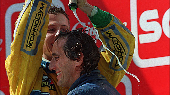 Michael Schumacher and Alain Prost on the podium at the 1993 Portuguese Grand Prix