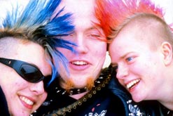 Punks with brightly-coloured mohican hairstyles