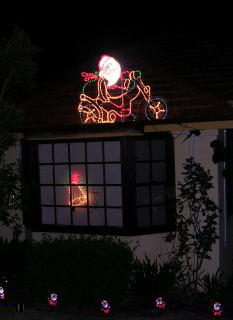 House decorations on Christmas Eve - the wheels on Santa