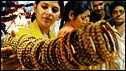 Indian women look at bangles 