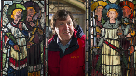 Cadw's Inspector of Ancient Monuments , Rick Turner, with the two panels