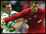 Jamie Carragher holds off Nicky Ward