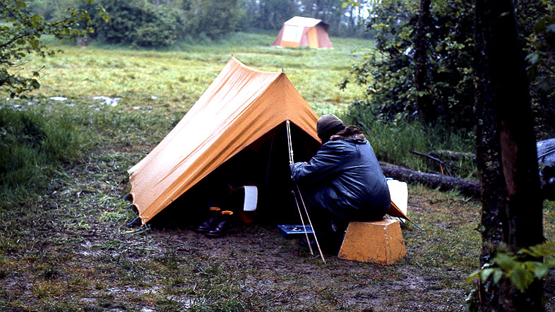 People camping in a tent