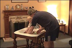 Graeme and Sally bath Joseph.