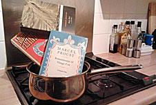 A saucepan with books in it