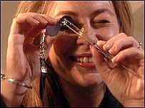 Anne checks her diamond