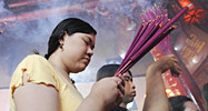Buddhist devotee prays in China