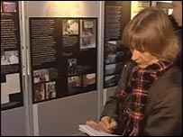 The exhibition features photos and letters from those who died