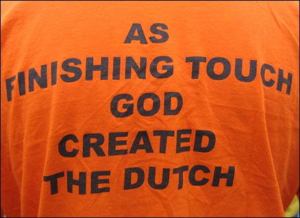 Netherlands fan with a T-shirt that proclaims God created the Dutch as a finishing touch