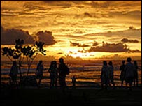 South Norfolk Youth Symphonic Band members and the sunset at Ban Naam Kem beach, Thailand