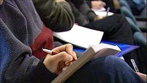 Student taking notes