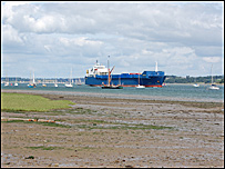 Mudflats on the River Orwell with container ship