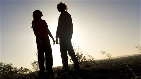 Scene from Samson and Delilah. Two figures in desert landscape.