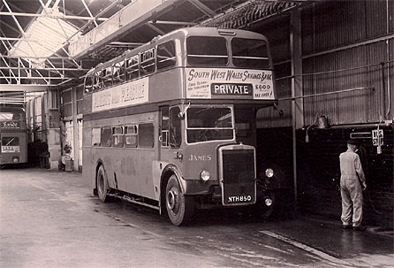 Photograph of Roy Noble's father by a Leyland double decker bus