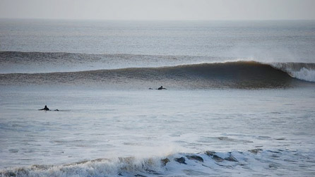 Waves at Rest Bay by Martin Aaron