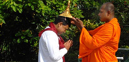 Basil Rajapaksa blessed by Buddhists monks before taking oaths as an MP