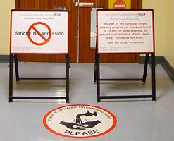 Signs showing a hospital ward is closed for deep cleaning