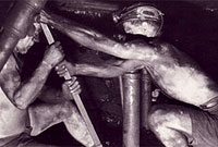 Dynion yn gweithio mewn pwll glo