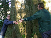 BBC presenter Victoria Graham hugging a tree