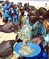 Children queuing for food aid