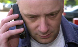 Man using mobile phone.