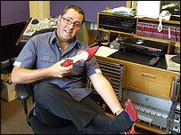 Ian Wyatt tries on some high-heeled shoes